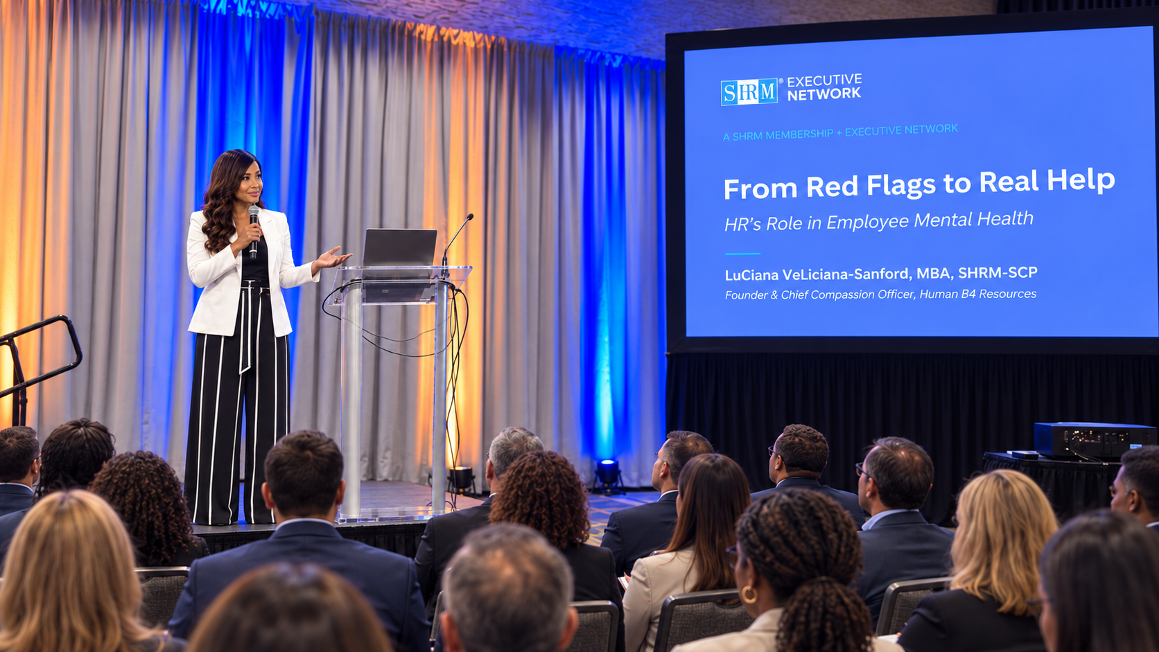 LuCiana presenting From Red Flags to Real Help at a SHRM Executive Network stage